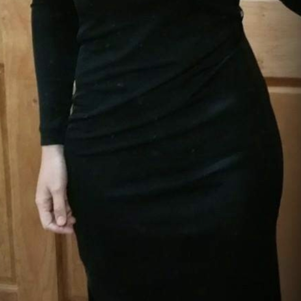 Bebe long sleeve open back floor length dress
